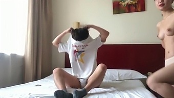 A Pair Of Chinese Lovers In A Motel Suite